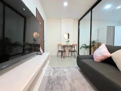 Modern living room with sleek furniture and stylish decor