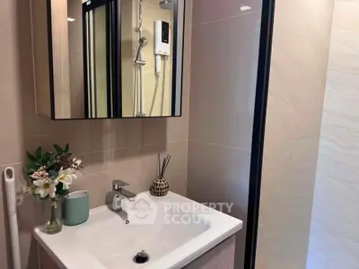 Modern bathroom with sleek sink and stylish decor