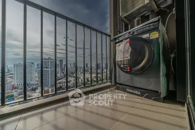 Modern balcony with city view and washing machine, perfect for urban living.