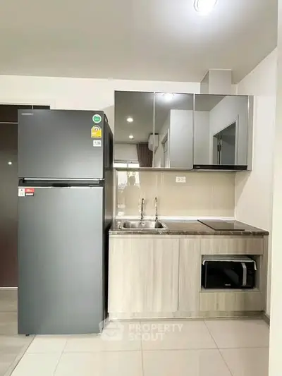 Modern kitchen with sleek appliances and minimalist design