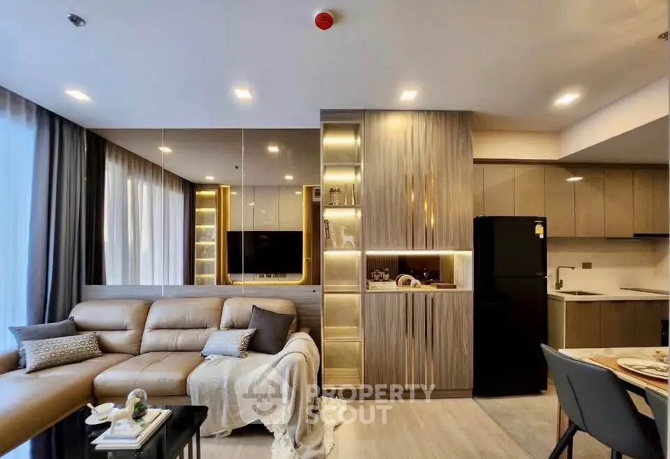 Luxurious modern living room with elegant decor and open kitchen layout