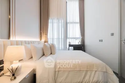 Luxurious modern bedroom with elegant decor and natural light