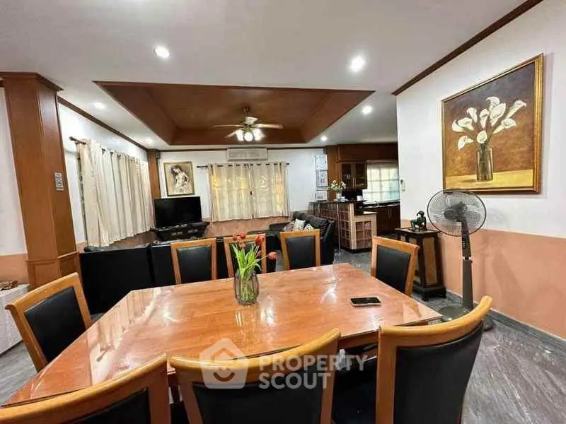 Spacious living room with elegant dining area and modern decor