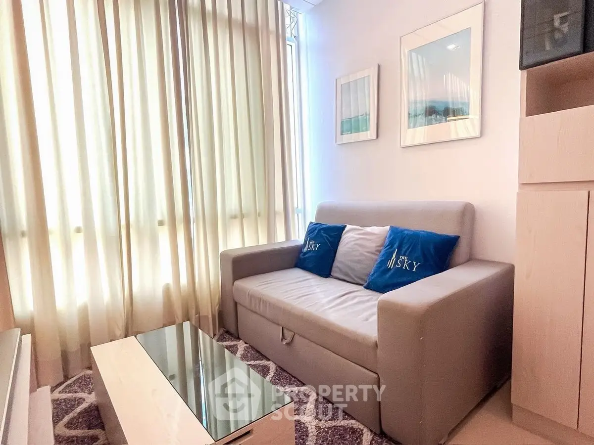 Cozy living room with modern sofa and stylish decor