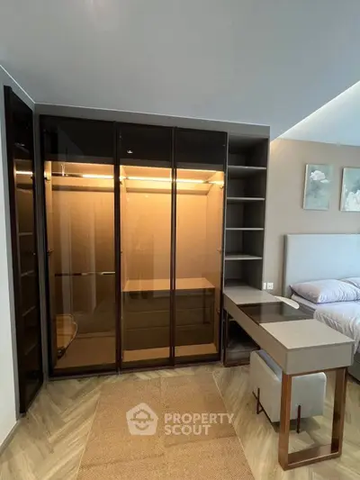 Luxurious bedroom with elegant walk-in closet and modern furniture design