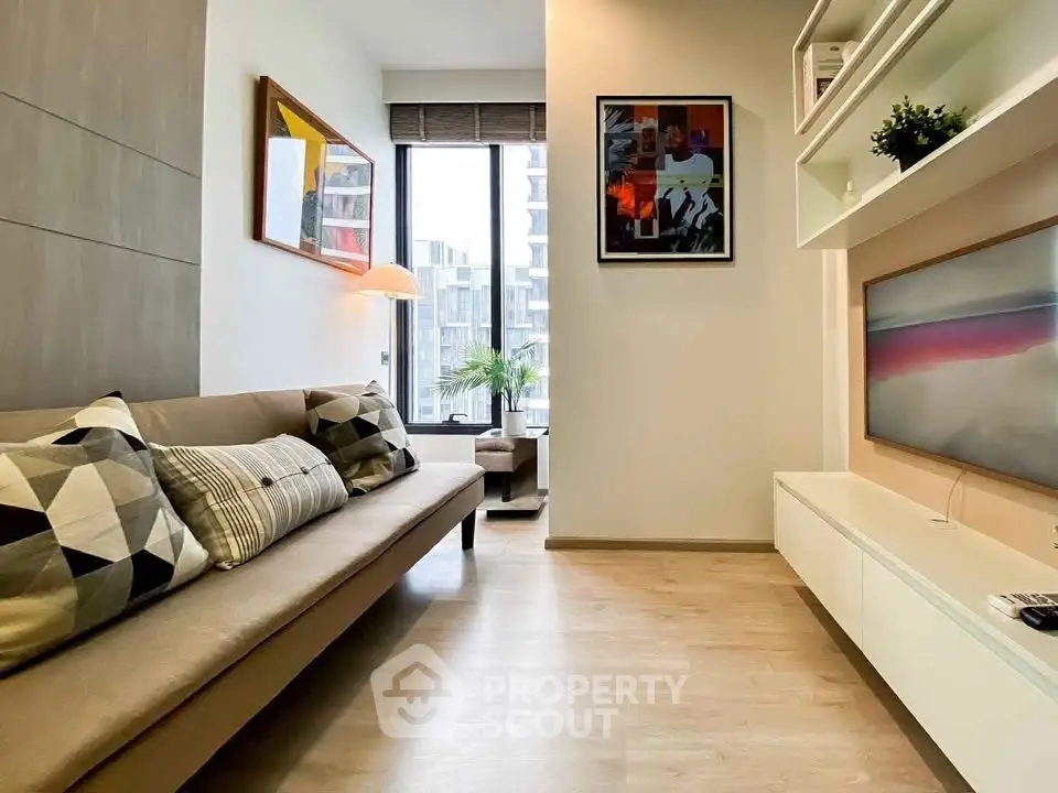 Modern living room with stylish decor and large window view