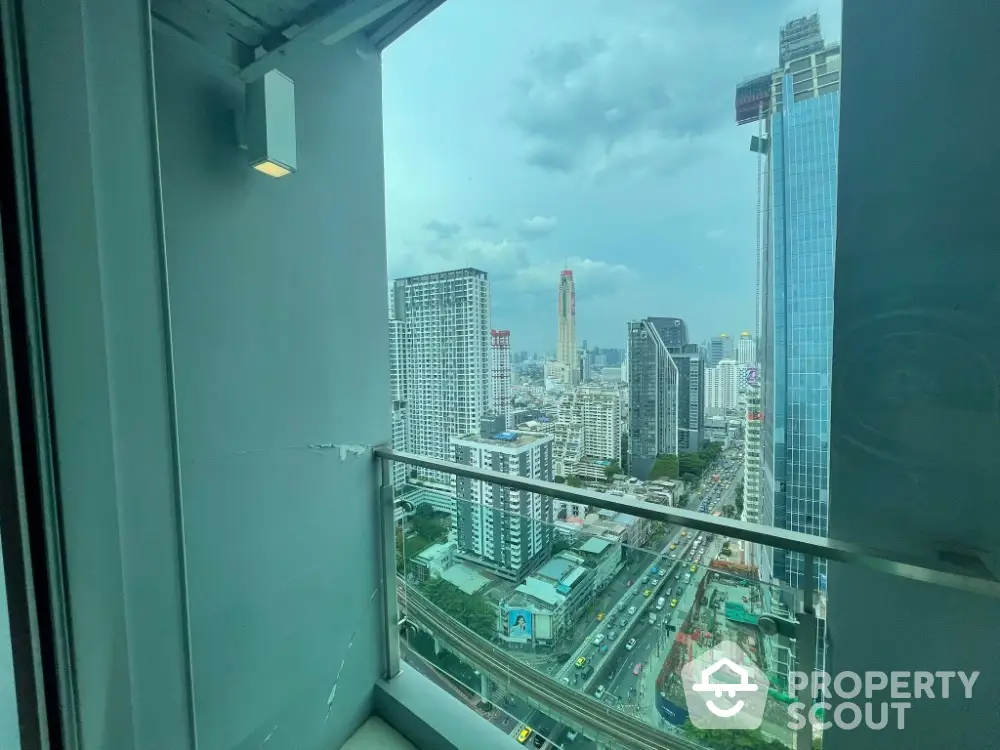 Stunning city view from high-rise balcony in urban skyline