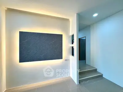 Modern minimalist interior with sleek lighting and tiled flooring