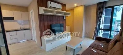 Modern living room with open kitchen and large window view