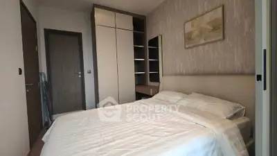 Cozy bedroom with modern decor and ample storage space