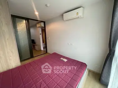 Cozy bedroom with air conditioning and modern decor