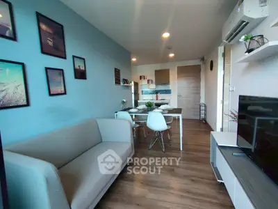 Modern living room with stylish decor and open kitchen layout