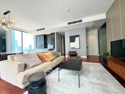 Luxurious modern living room with city view, stylish furniture, and elegant decor in high-rise apartment.