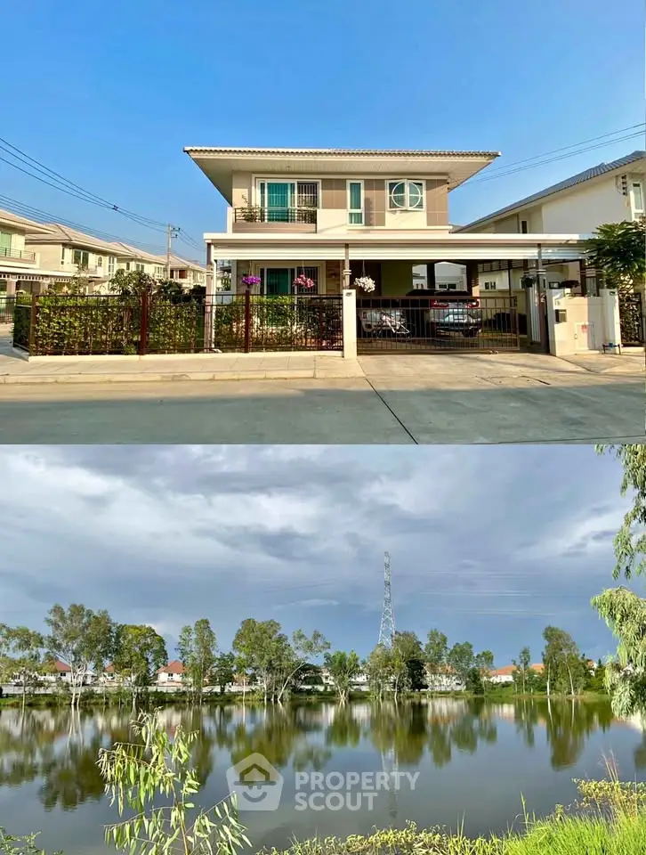 Charming two-story house with a serene lakeside view, perfect for tranquil living.