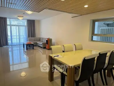 Spacious modern living room with elegant dining area and large windows