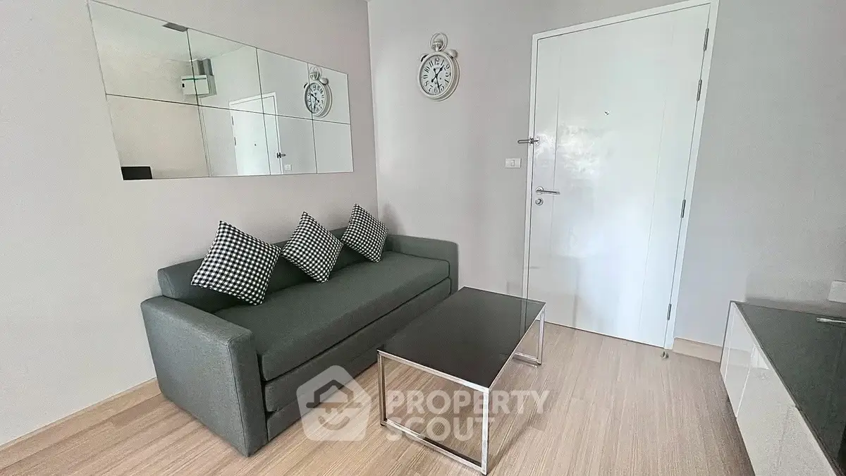 Modern living room with sleek sofa and stylish decor