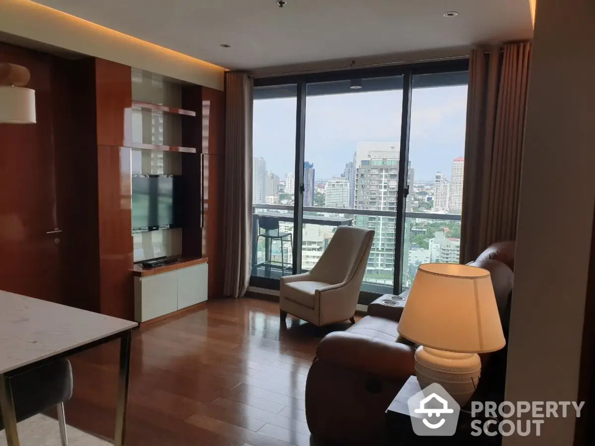 Luxurious living room with city view and modern furnishings in high-rise apartment