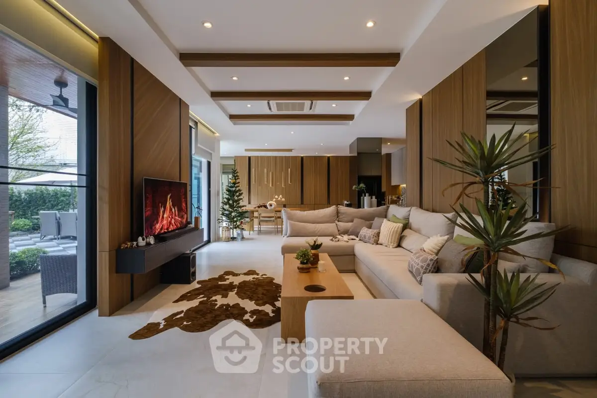 Luxurious modern living room with cozy fireplace and elegant decor