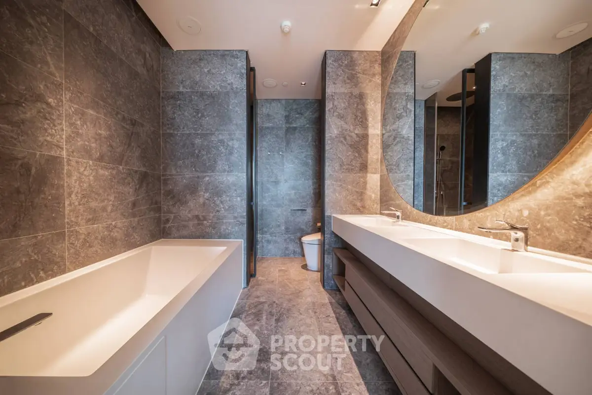 Luxurious modern bathroom with elegant fixtures and spacious design