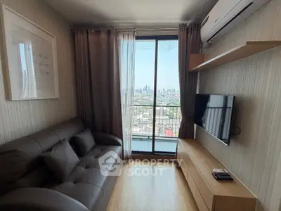 Modern living room with city view, featuring sleek furniture and air conditioning.