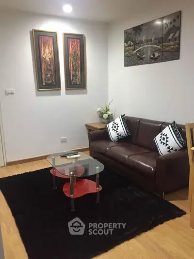 Cozy living room with stylish decor and modern furniture, perfect for relaxation and entertaining guests.