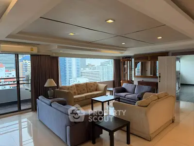 Spacious living room with city view and elegant furniture in high-rise apartment