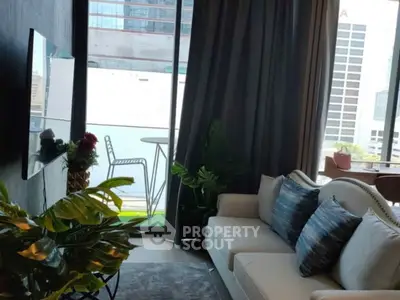 Modern living room with balcony view in urban apartment