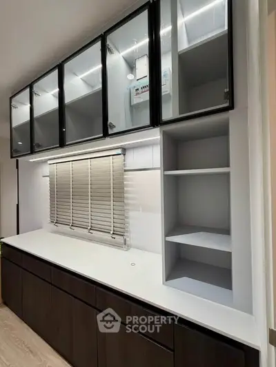 Modern kitchen with sleek cabinetry and ample storage space
