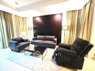 Luxurious modern living room with elegant furniture and ambient lighting