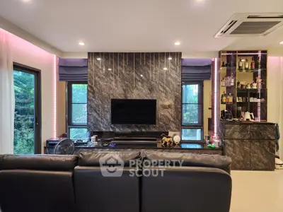 Luxurious living room with modern decor and stylish lighting