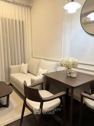 Elegant living room with cozy seating and stylish decor