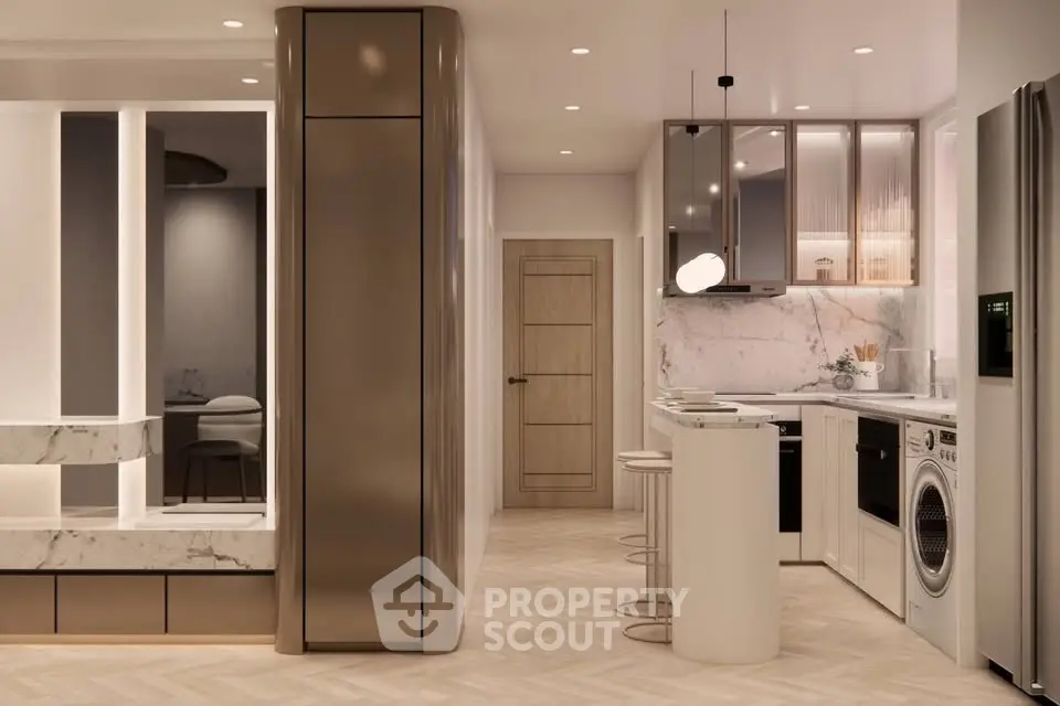 Modern kitchen with sleek appliances and stylish lighting