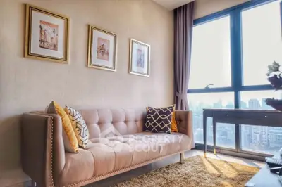 Stylish living room with plush sofa and city view window