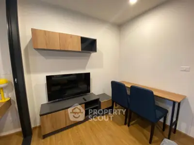 Modern living room with stylish wooden furniture and sleek TV setup