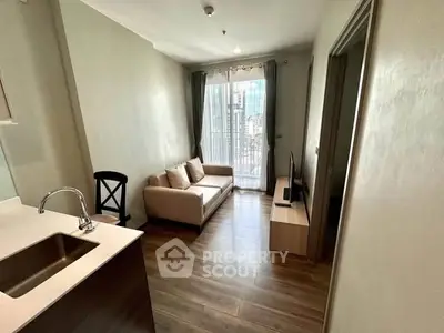 Modern living room with cozy sofa and city view from large window