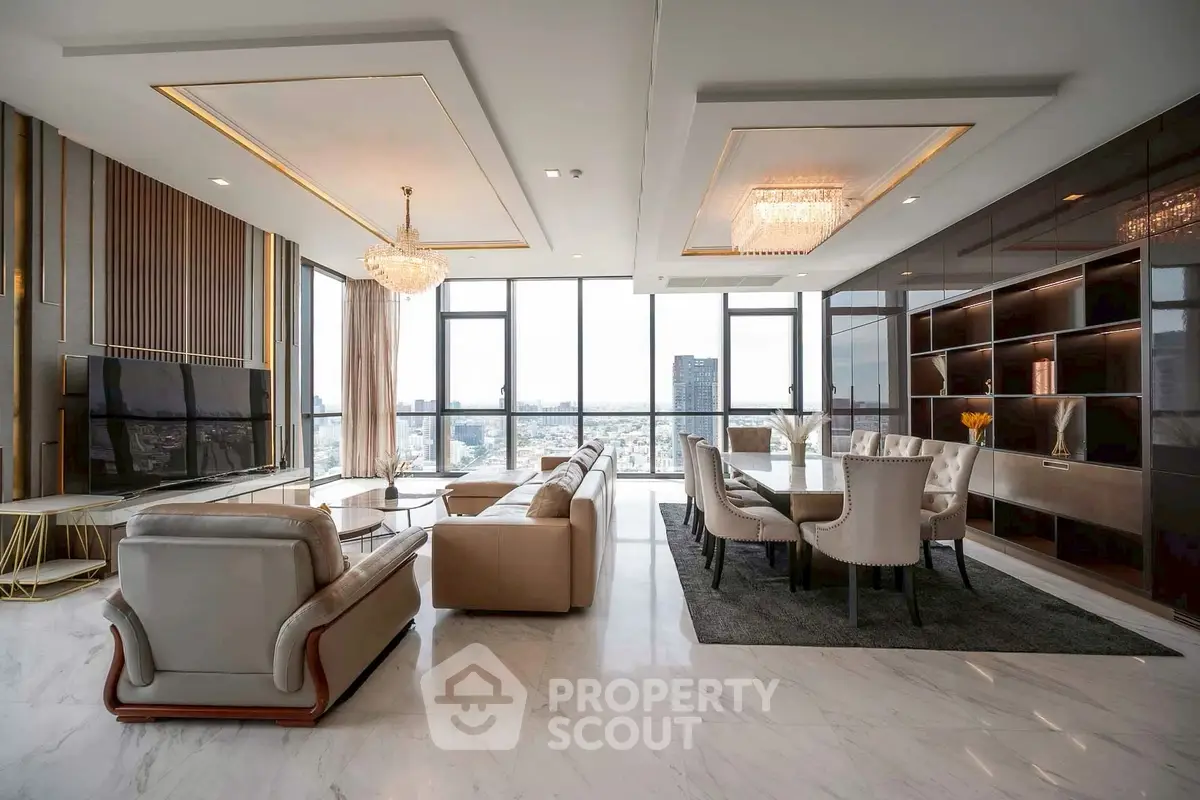Luxurious modern living room with panoramic city views and elegant furnishings.