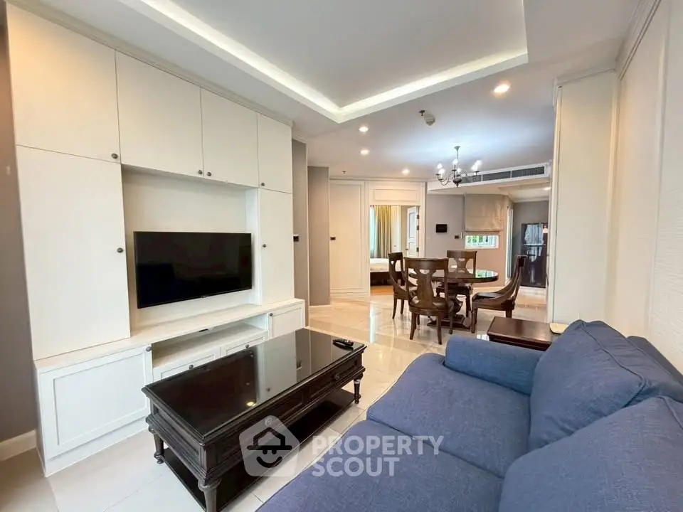 Spacious living room with modern furniture and elegant dining area