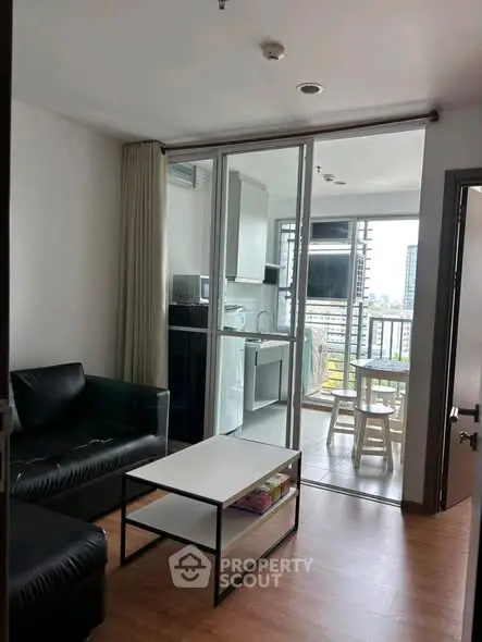 Modern living room with balcony view in urban apartment