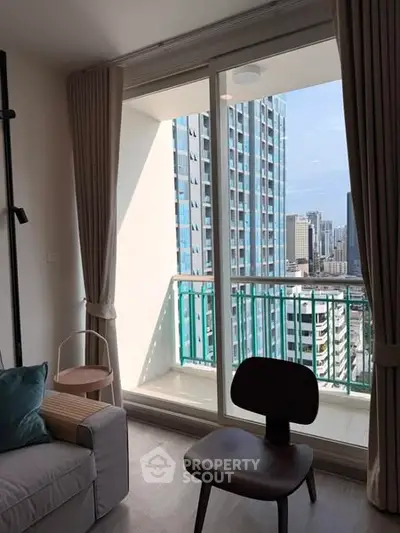 Modern living room with city view balcony in high-rise apartment