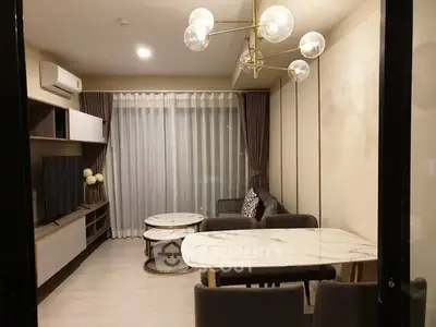 Modern living room with elegant lighting and stylish furniture