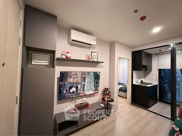 Modern living room with sleek design and open kitchen layout