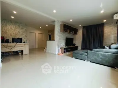 Spacious modern living room with sleek furniture and stylish decor
