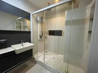 Modern bathroom with spacious shower and sleek design