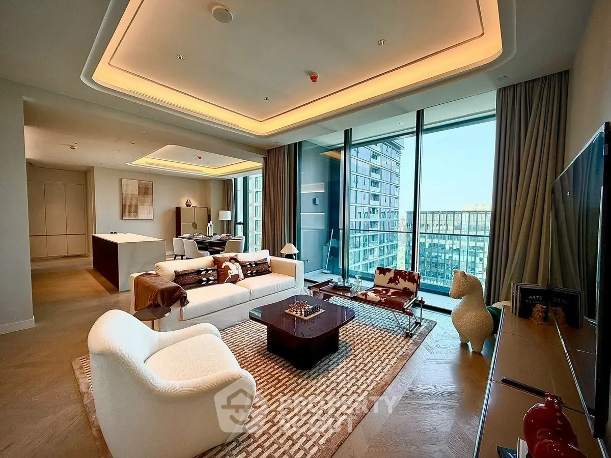 Luxurious modern living room with floor-to-ceiling windows and stunning city view