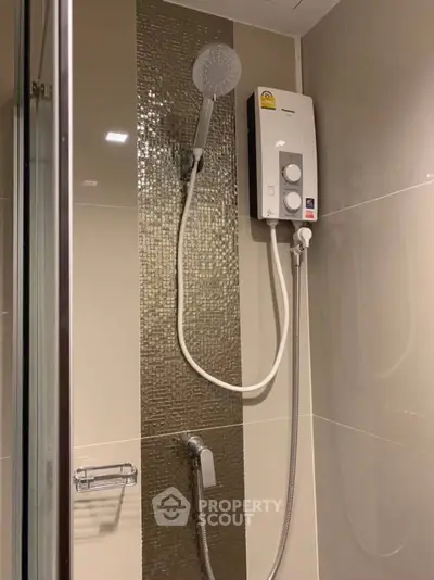 Modern bathroom with sleek shower and water heater installation