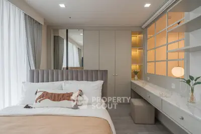 Luxurious bedroom with elegant decor and natural light