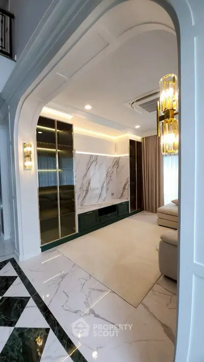 Luxurious living room with marble accents and elegant lighting