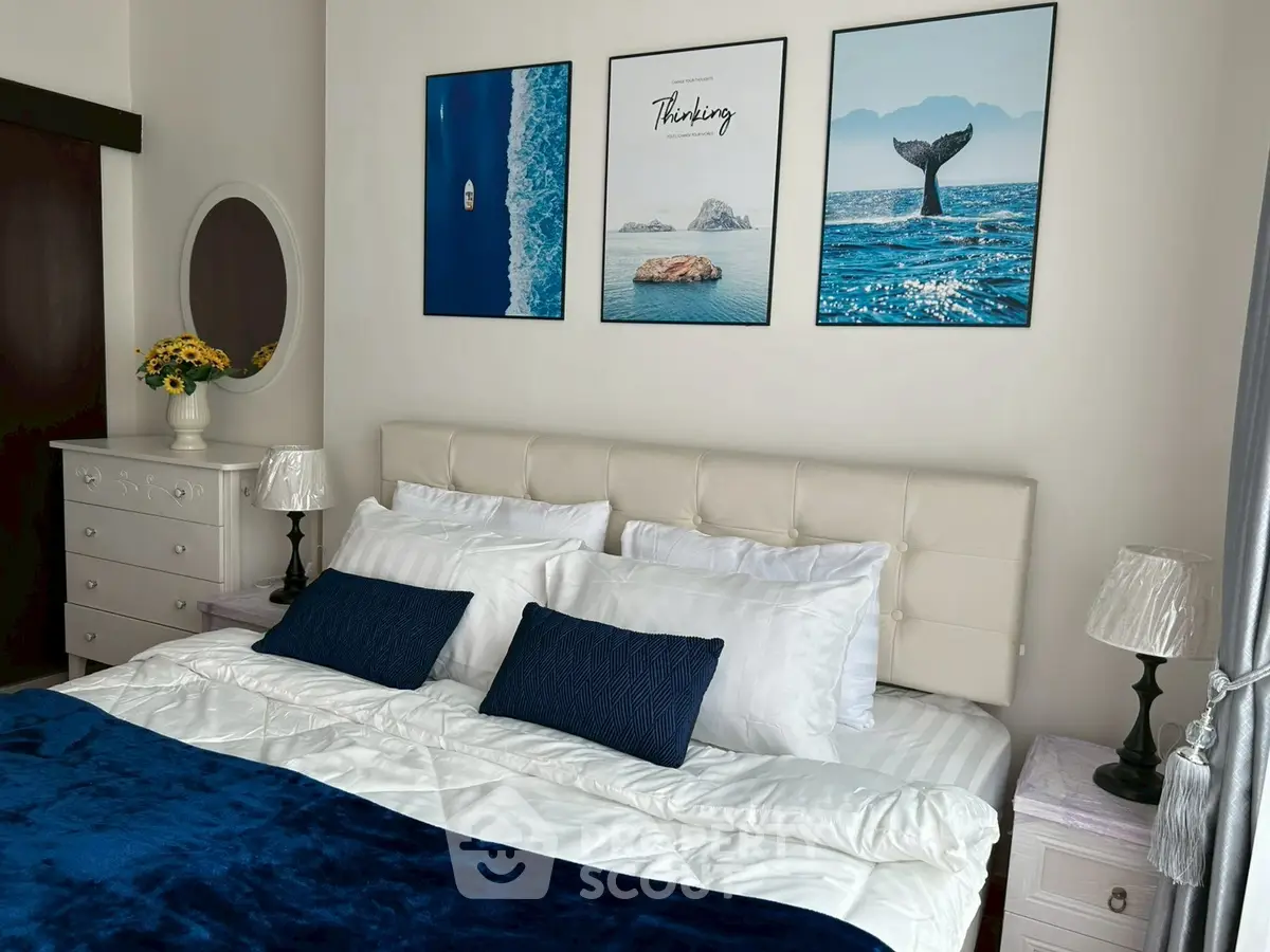 Elegant bedroom with stylish decor and cozy bedding, perfect for relaxation.