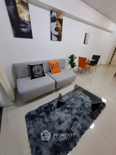 Stylish modern living room with designer sofa and chic decor