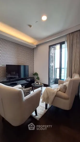Modern living room with elegant decor and balcony access